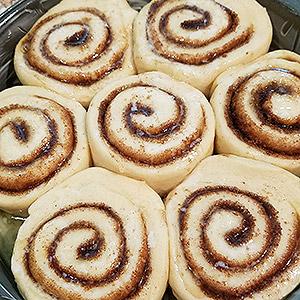 image for a (No Longer Available) Junior Chefs (ages 9-14): A Homemade Cinnamon Rolls Workshop for Kids!