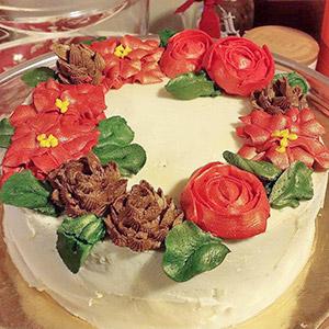 image for a (No Longer Available) A Holly Jolly Cake Decorating Workshop!  Poinsettia & Christmas Wreath Cakes