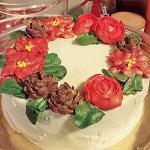 The image for (No Longer Available) A Holly Jolly Cake Decorating Workshop! Poinsettia & Christmas Wreath Cakes